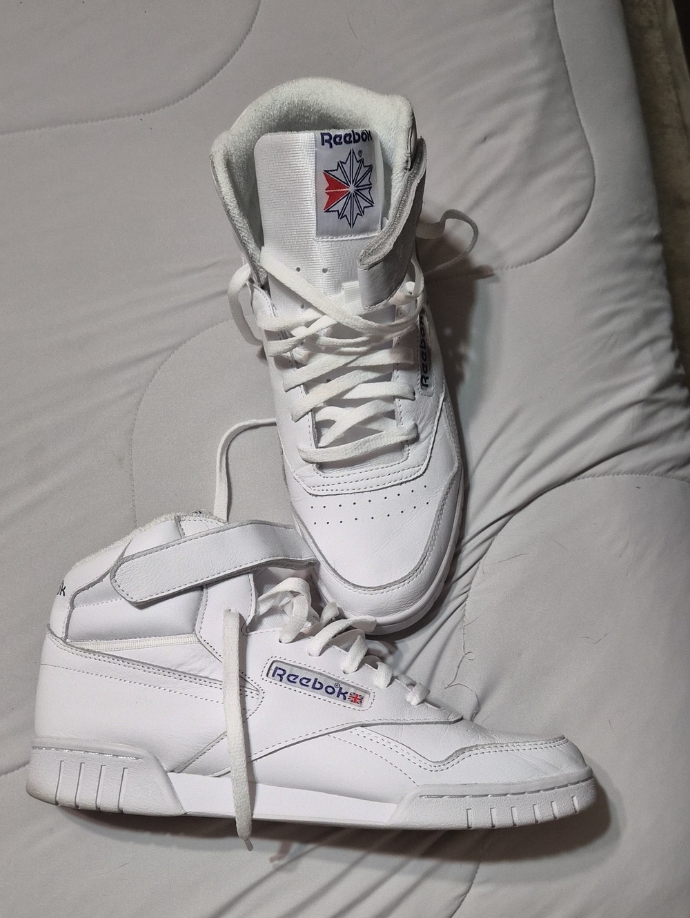 Reebok White High-Top Leather Sneakers with Red & Blue Logo